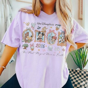 May include: A set of three ceramic mugs with a speckled, matte finish. The mugs are in shades of cream, light gray, and dark gray. Each mug has a simple, minimalist design and a rounded handle.