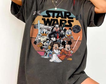 Maglietta retrò di Star Wars Topolino e i suoi amici, maglietta Disney di Topolino e Han Solo, magliette di Goofy Stormtrooper, maglietta di Paperino Jedi, maglietta di Galaxy's Edge