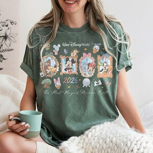 May include: A set of three ceramic mugs with a speckled, matte finish. The mugs are in shades of cream, light gray, and dark gray. Each mug has a simple, minimalist design, perfect for coffee or tea.