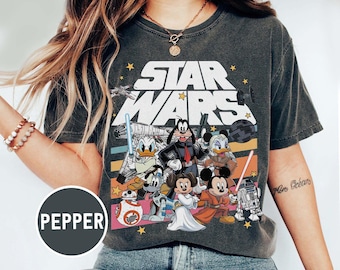 Maglietta di Topolino e i suoi amici di Star Wars, maglietta Disney di Topolino e Han Solo, magliette di Goofy Stormtrooper, maglietta di Paperino Jedi, magliette di Galaxy's Edge