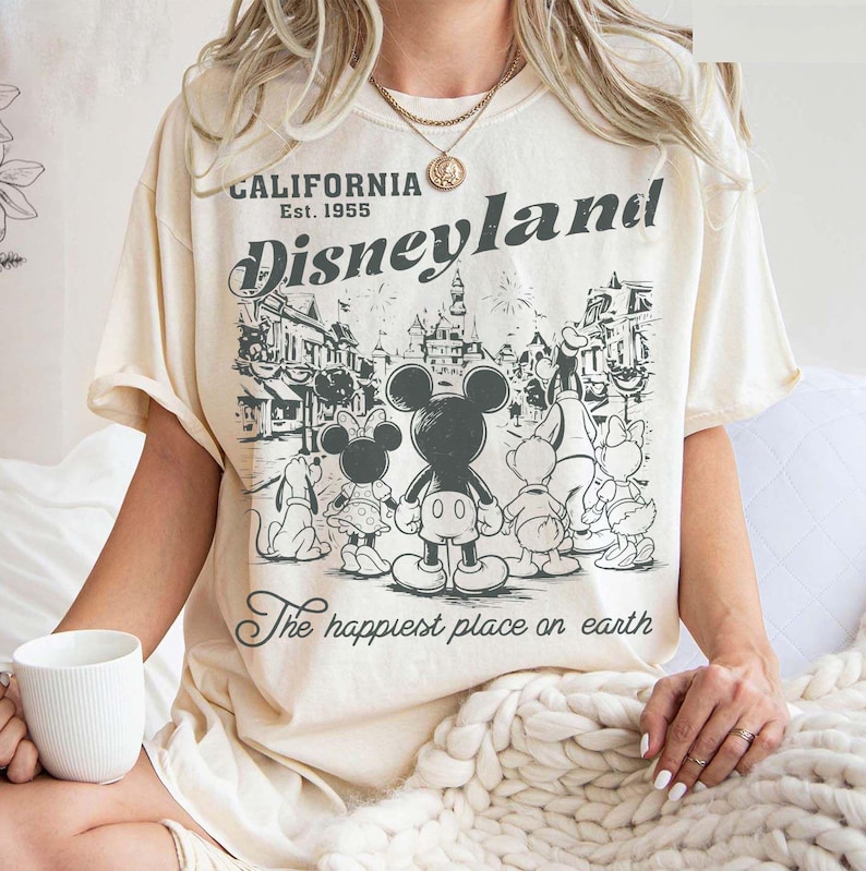 May include: A set of three ceramic mugs with a speckled, matte finish. The mugs are in shades of cream, light gray, and dark gray. Each mug has a simple, minimalist design, perfect for coffee or tea.