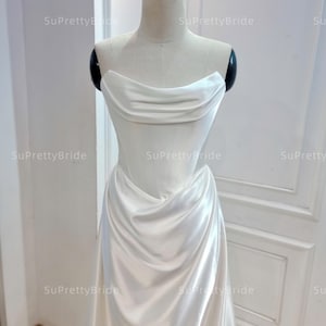 Elegant A-line silk satin wedding dress. Sexy strapless corset wedding dress. Custom wedding dress on request.