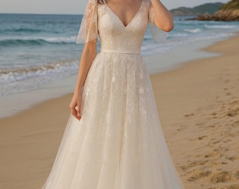 Beautiful A-line lace wedding dress with butterfly sleeves. Made to measure wedding dress. Custom wedding dress upon request.