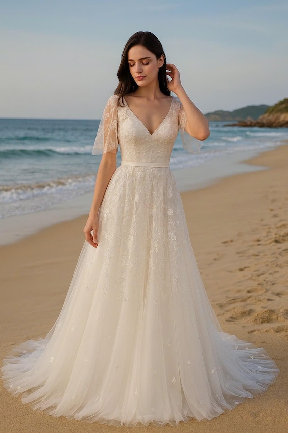 Beautiful A-line lace wedding dress with butterfly sleeves. Made to measure wedding dress. Custom wedding dress upon request.