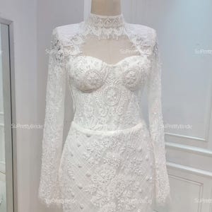 Beautiful lace mermaid wedding dress. Wedding dress with convenient cape. Custom long sleeve mermaid wedding dress.