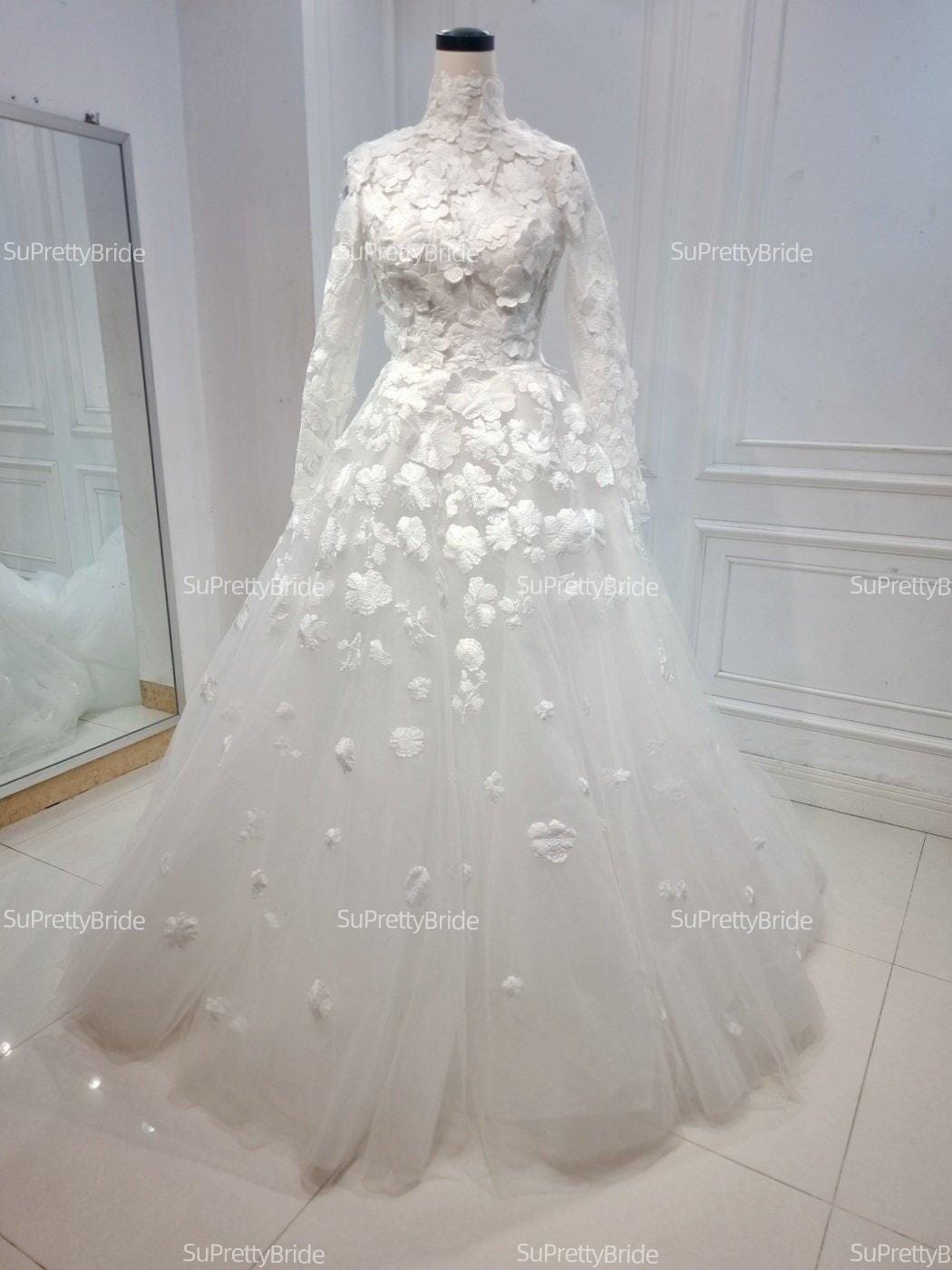 Paris Hilton inspired wedding dress. Luxury 3D floral wedding dress. High neck, long sleeve wedding dress for church wedding. Paris Hilton inspired wedding dress. Luxury 3D floral wedding dress. High neck, long sleeve wedding dress for church wedding.