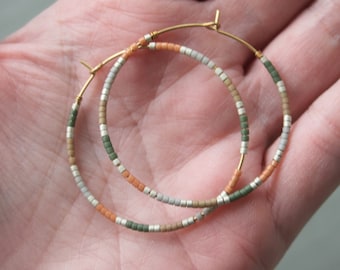 earrings, dangle earrings, trendy jewelry, boho jewelry, beaded hoops, hoop earrings, brass hoops, seed bead hoops, beaded hoop earrings