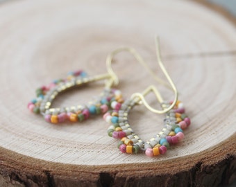 earrings, dangle earrings, trendy jewelry, boho jewelry, beaded hoops, woven earrings, seed bead earrings, bronze hoops, seed bead hoops