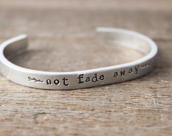 Hand Stamped Aluminum Cuff Bracelet: 'Not Fade Away'
