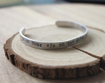 Stamped Bracelet, Adjustable cuff, david lynch, twin peaks,  Cuff Bracelet, aluminum cuff, keep your eye on the donut and not on the hole