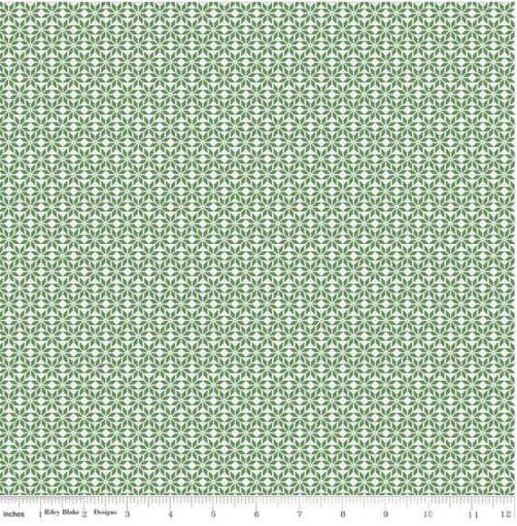 FABRIC CHRISTMAS Claus & Co. Snow covered houses pink and green