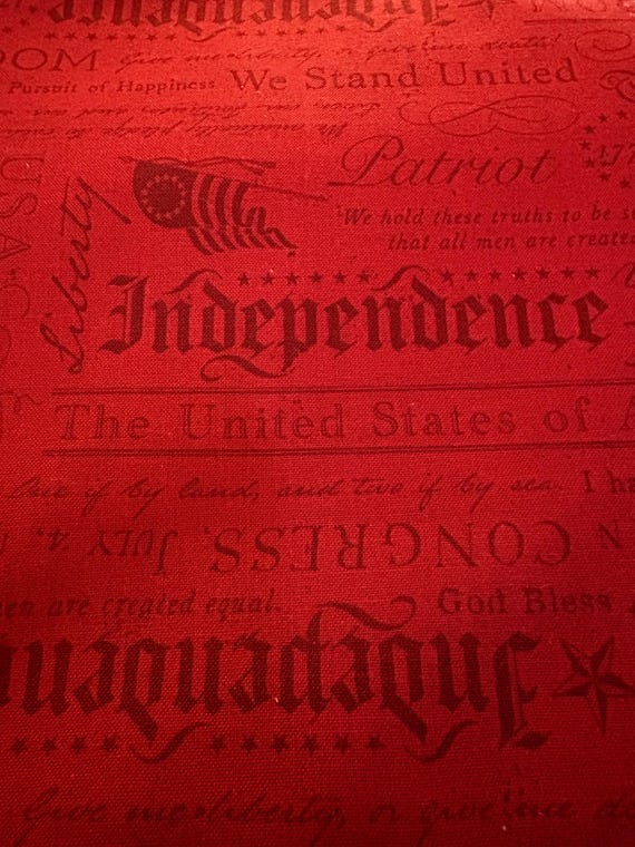 FABRIC DECLARATION of INDEPENDENCE tonal red words on red
