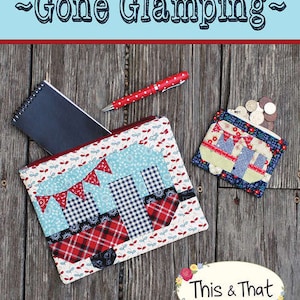 May include: A quilted zippered pouch and small wallet with a camper design, featuring red, blue, and white fabrics. A red pen, a small notebook, and coins are also visible. The text "Gone Glamping" is at the top.