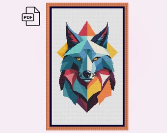 Peut inclure: Un motif de point de croix représentant une tête de loup géométrique et colorée. Le loup est bleu, rouge, jaune, orange et violet. Le motif est dans un cadre blanc.