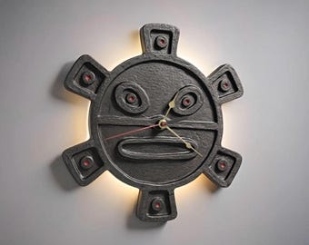 Taíno sun symbol wall clock: rustic stone-look decor, silent seiko movement