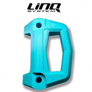 May include: A turquoise-colored, 3D-printed component with the text "SEA-DOO" and "LinQ SYSTEM" in black and white. The component has a unique shape with a handle-like design and two circular holes.