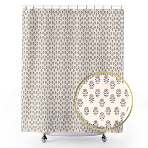 May include: A cream shower curtain with a repeating floral pattern. The pattern features small, stylized flowers in shades of mauve and navy blue. The flowers are arranged in a dense, all-over design, creating a cohesive and decorative look.