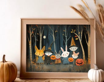 May include: A framed print featuring a whimsical Halloween scene. The artwork depicts a group of costumed animals, including foxes and rabbits, holding carved pumpkins in a dark forest setting. The print is in a wooden frame, with pumpkins on the wooden surface.