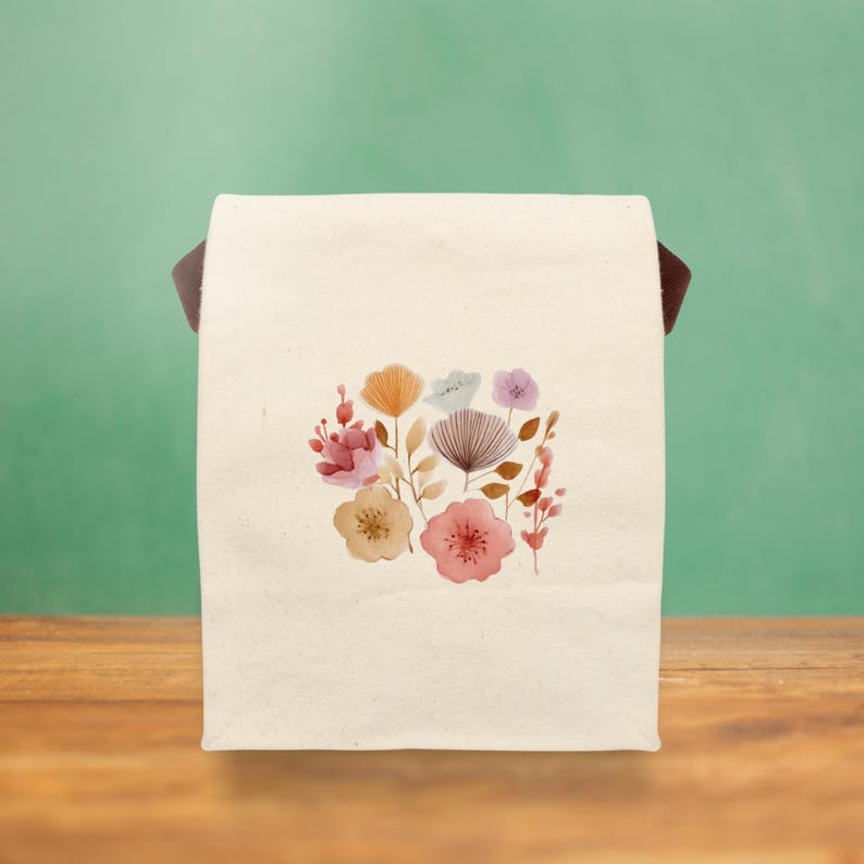 A Stylish Floral Canvas Lunch Tote with a soft watercolor design, perfect for daily use at school, the office, or park picnics.
