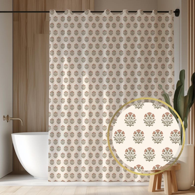 May include: Cream-colored shower curtain with a repeating floral pattern in muted red and green. The curtain is hanging in a bathroom setting, with a white bathtub and wooden accents visible.