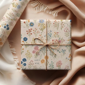 Playful floral pattern on a neutral background, cute “Make a Wish” gift wrap for birthdays and special occasion crafts.