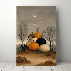 May include: A canvas print depicting a harvest scene with pumpkins. The artwork shows a collection of orange, white, and black pumpkins in front of a small house, under a night sky with a crescent moon and stars. Bare trees frame the scene.