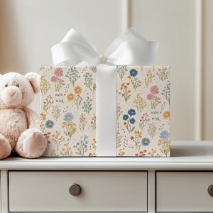 Vintage-inspired floral gift wrap in soft neutral tones, ideal for birthdays, anniversaries, and present packaging.