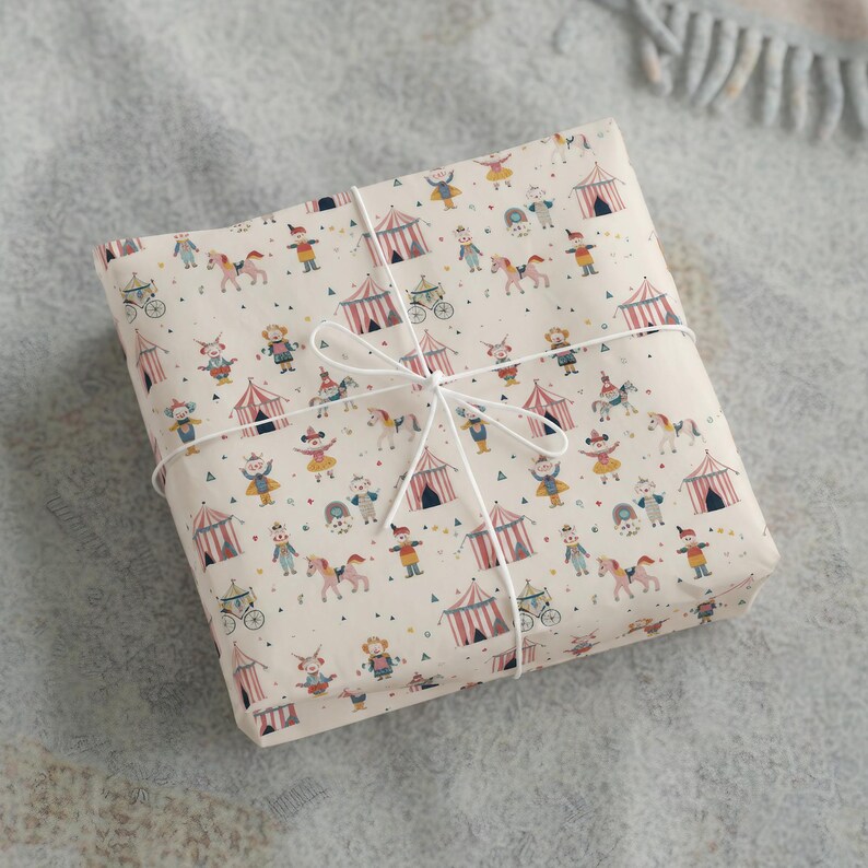 Colorful circus kids wrapping paper with big top tent and carnival animal illustrations, ideal for children’s birthday gift packaging