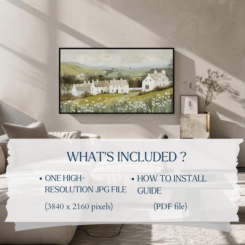 May include: A digital download of a painting depicting a row of white houses with green roofs in a rural landscape. The houses are surrounded by green fields and trees, and there are white flowers in the foreground. The painting is framed in a black frame and is hanging on a wall in a living room.