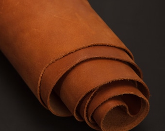 May include: A roll of brown leather, tightly wound and ready for crafting.