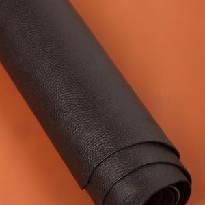 Cuero flotante de grano completo negro, curtido al aceite, 1,6-1,8 mm