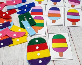 May include: A felt ice cream cone matching game with colorful felt pieces and corresponding picture cards. The felt pieces have buttons for fastening.