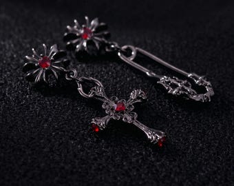 Pendientes góticos de cruz desigual, joyería estilo Dark Academia para un look audaz.