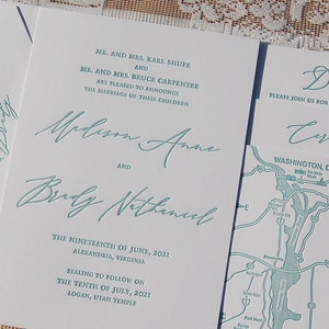 May include: White wedding invitation suite with teal script. The invitation includes the names Madison Anne and Brady Nathaniel, along with the wedding date and location in Alexandria, Virginia. A map of Washington, D.C. is also included.