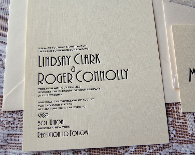 May include: Ivory wedding invitation with black text. The invitation includes the names "Lindsay Clark & Roger Connolly", wedding details, and the address "501 Union, Brooklyn, New York". The invitation is part of a set.
