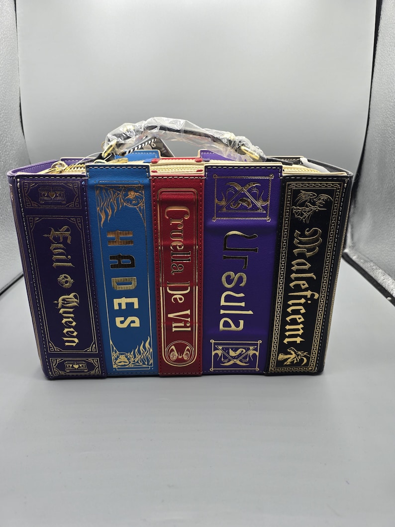 Loungefly villains books crossbody bag NWT and pin limited edition image 1