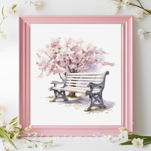 May include: A watercolor painting of a white wooden bench with a gray metal frame, sitting under a pink cherry blossom tree. The bench is in the foreground, and the tree is in the background. The painting is on a white background.