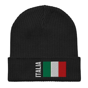 May include: Black knitted beanie with a white "ITALIA" text and the Italian flag embroidered on the cuff.
