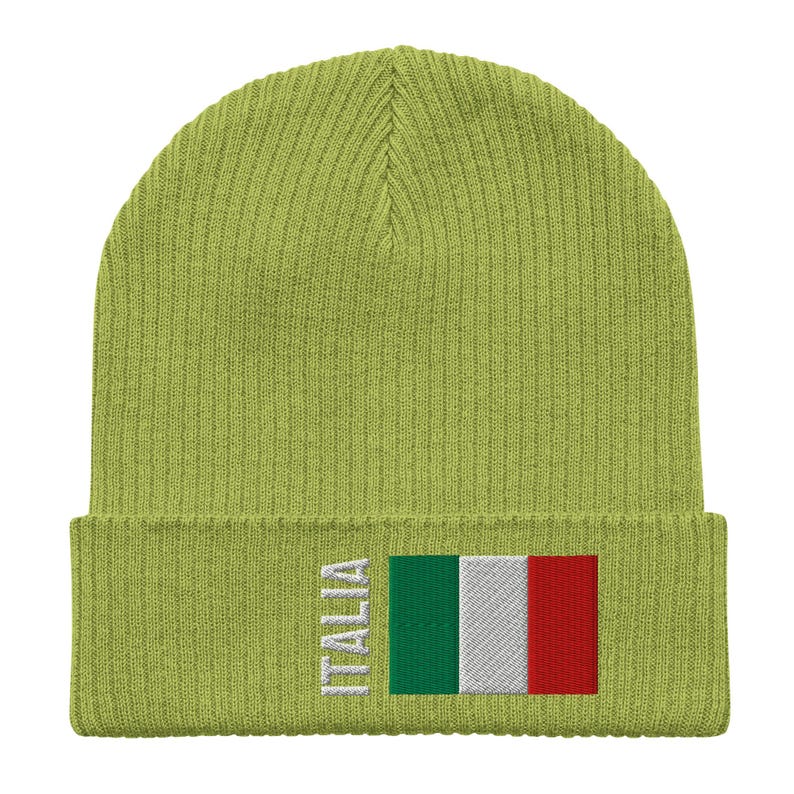 May include: A green knitted beanie with the Italian flag and the word "ITALIA" embroidered on the front.