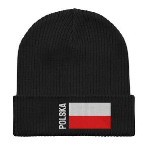 May include: Black knitted beanie with a white and red Polish flag and the word "POLSKA" embroidered on the side.