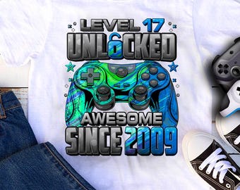 Maglietta sbloccata livello 17, maglietta per il 17° compleanno del giocatore, per ragazzo di 17 anni, maglietta di compleanno 17, maglietta fantastica dal 2009 per giocatori