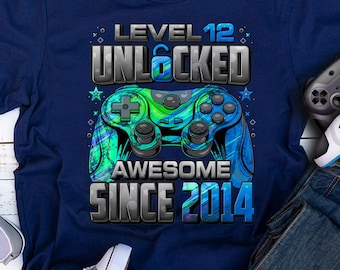 Maglietta sbloccata livello 12, maglietta per il 12° compleanno del giocatore, per ragazzo di 12 anni, maglietta di compleanno 12, maglietta fantastica dal 2014 per giocatori