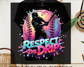 May include: Black t-shirt with a vibrant graphic of a baseball player mid-swing. The design showcases a baseball with pink and purple hues, and the text "Respect the Drip". The words "DTF Transfer" and "Ready to Press" are also visible on the image.