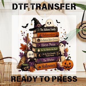 May include: A DTF transfer graphic featuring a stack of books titled The Addams Family, Halloweentown, The Nightmare Before Christmas, Hocus Pocus, Are You Afraid of the Dark?, It's the Great Pumpkin, Charlie Brown, The Witches, and Halloween.