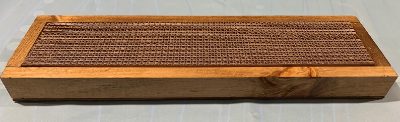 Handmade Cat scratcher furniture for cats and kitties that far outlasts the cardboard versions.