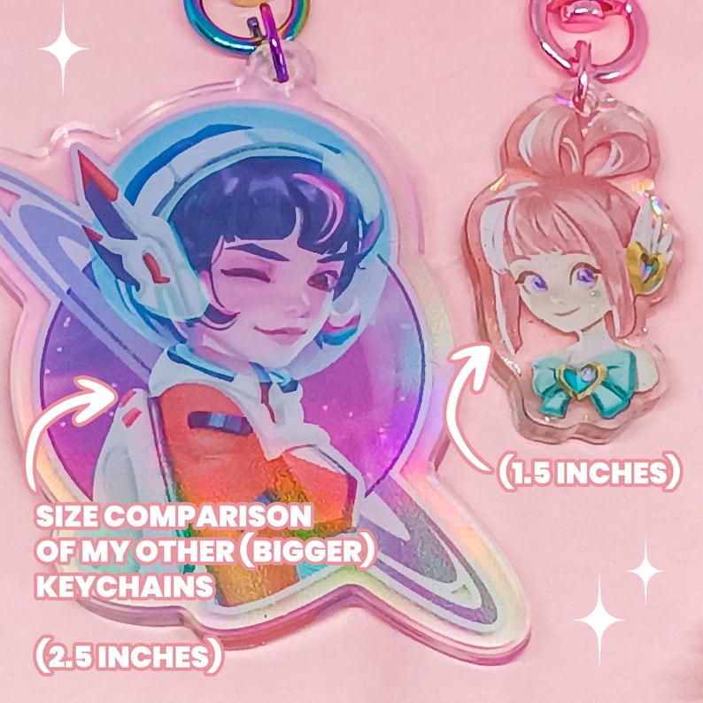 Overwatch mini keychains featuring Pink Mercy, Dokiwatch Juno, Rainy Day Kiriko, and Rainy Day Mei. Each is 1.5 inches with double-sided glitter epoxy and a broken glass holographic effect on one side. Cute Overwatch gift for support mains, gamer girls, and fans of OW2 skins and collectibles. Great for bags, backpacks, and keys. Handmade fanmade merchandise for Overwatch lovers and kawaii gaming aesthetic. Painted and produced by Chryssv.