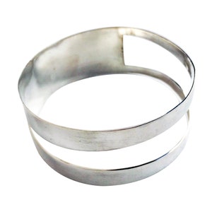 Wide geometric bangle bracelet