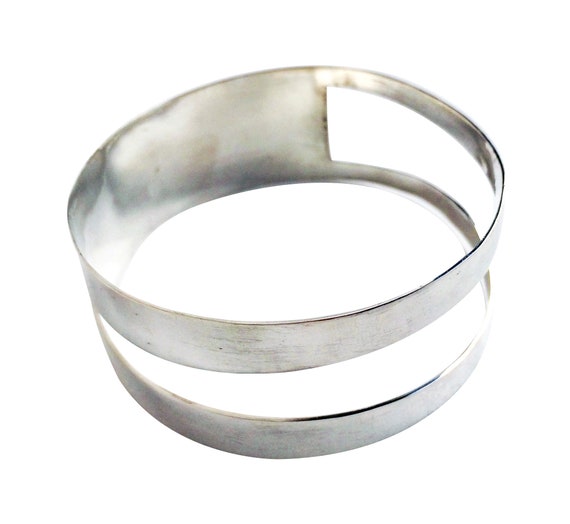 Wide geometric bangle bracelet