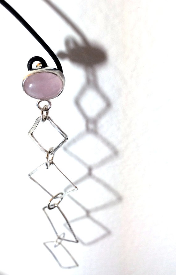 Long, lightweight, sterling silver dangle earring with rose quartz stud