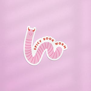 May include: Pink worm sticker with the text "Spicy Book Worm" in red lettering.